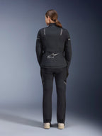 Alpinestars Women Stella ST-7 2L GORE-TEX Jacket, Black and Dark Gray, back view featuring the silver Alpinestars logo on the lower back, paired with matching black textile pants, adventure touring motorcycle gear