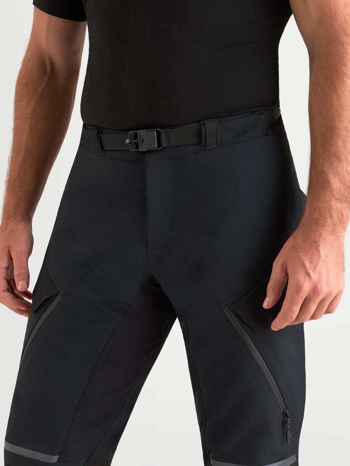 Alpinestars St-7 V2 2L Gore-Tex Pants Short, men's adventure touring motorcycle pants in black, close-up view of the waist and integrated belt worn by a model.