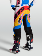 Alpinestars Supertech Dyna Pants in white and blithe blue, premium motocross racing pants on-model with tech-air ready construction and ventilated panels.