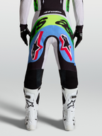 Alpinestars Supertech Dyna Men's Motocross Pants, rear view in light lilac and green fluo with perforated stretch panels.