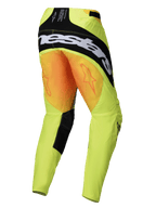 Alpinestars 2025 Techstar Melt Pants, Motocross Pants, Yellow and Black, rear view showing a large black Alpinestars logo across the seat and orange star graphics on the thighs, fluorescent yellow technical fabric with black inner leg panels.