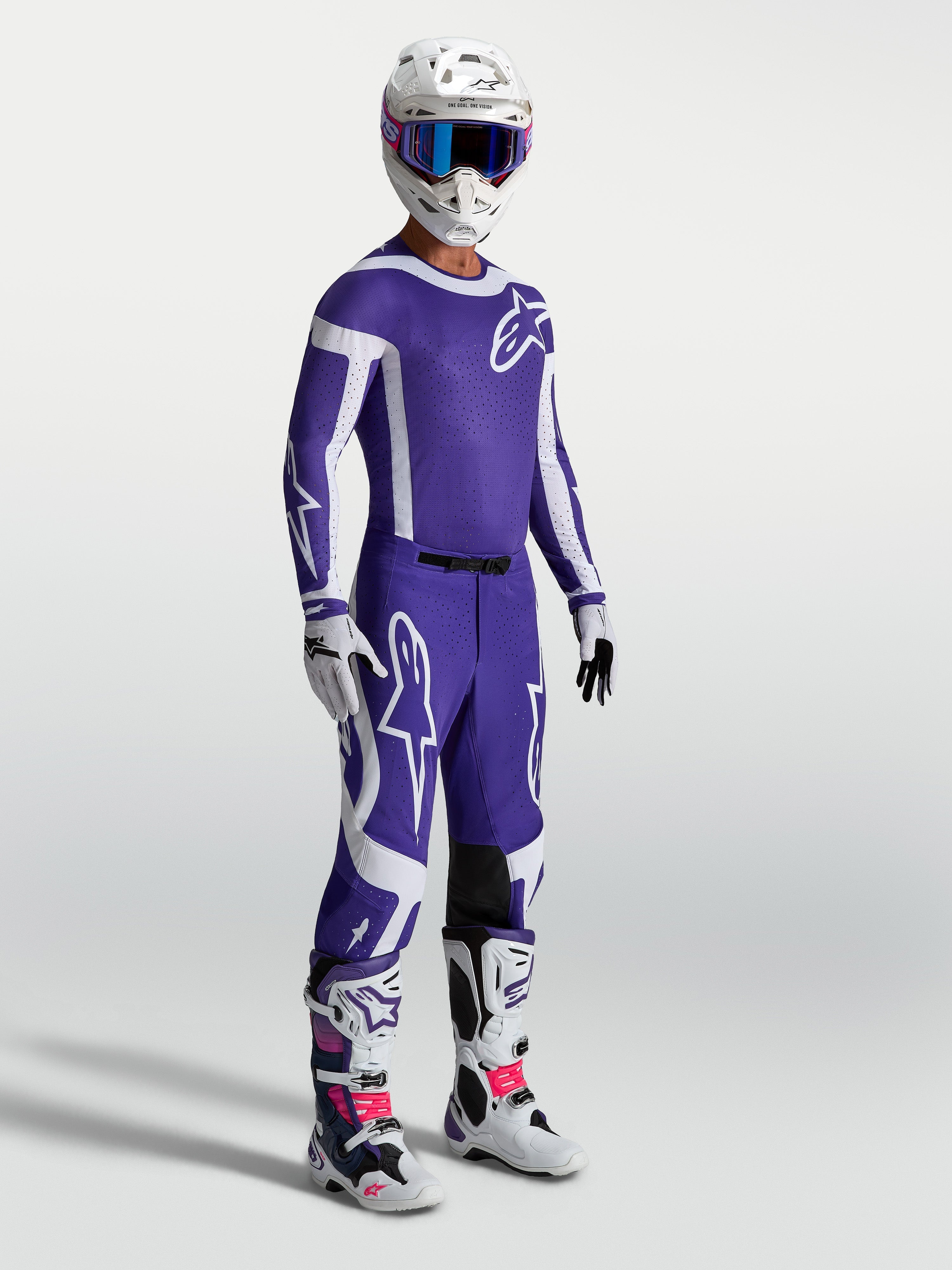 Alpinestars Supertech Vesta Pants in Deep Blue and White, professional motocross gear on-model with matching racing set.