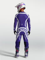 Alpinestars Supertech Vesta Pants and Jersey, Deep Blue and White motocross racing gear set shown from a rear view on model.