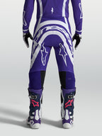 Alpinestars Men's Supertech Vesta Motocross Pants, Deep Blue and White, rear view showing athletic fit and rip-stop fabric.