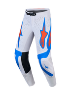 Alpinestars Supertech Vesta Men's Motocross Pants in white, light lilac, and cardinal red with perforated panels.