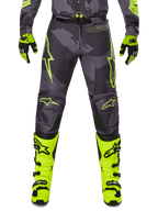 2025 Racer Hollow Pants, Motocross Pants, Gray with Neon Yellow, featuring star logos and text, paired with black and yellow gloves and yellow boots with black buckles, sporty protective design for off-road racing