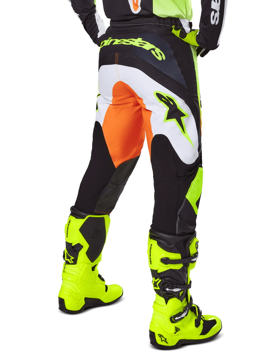 Alpinestars 2025 Fluid Wurx Pants, Motocross Pants, Yellow and Black with orange and white accents, back view worn with matching bright yellow boots, durable construction with bold branding for dirt bike riding