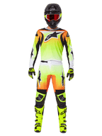 Alpinestars 2025 Fluid Wurx Pants, Motocross Pants, Yellow and Black with orange and white gradient, worn with matching jersey, bright yellow boots, and black helmet with red goggles, full motocross racing kit