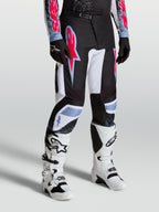 Alpinestars Fluid Drag Pants, men's motocross racing pants in black and white with red fluo and light blue accents.
