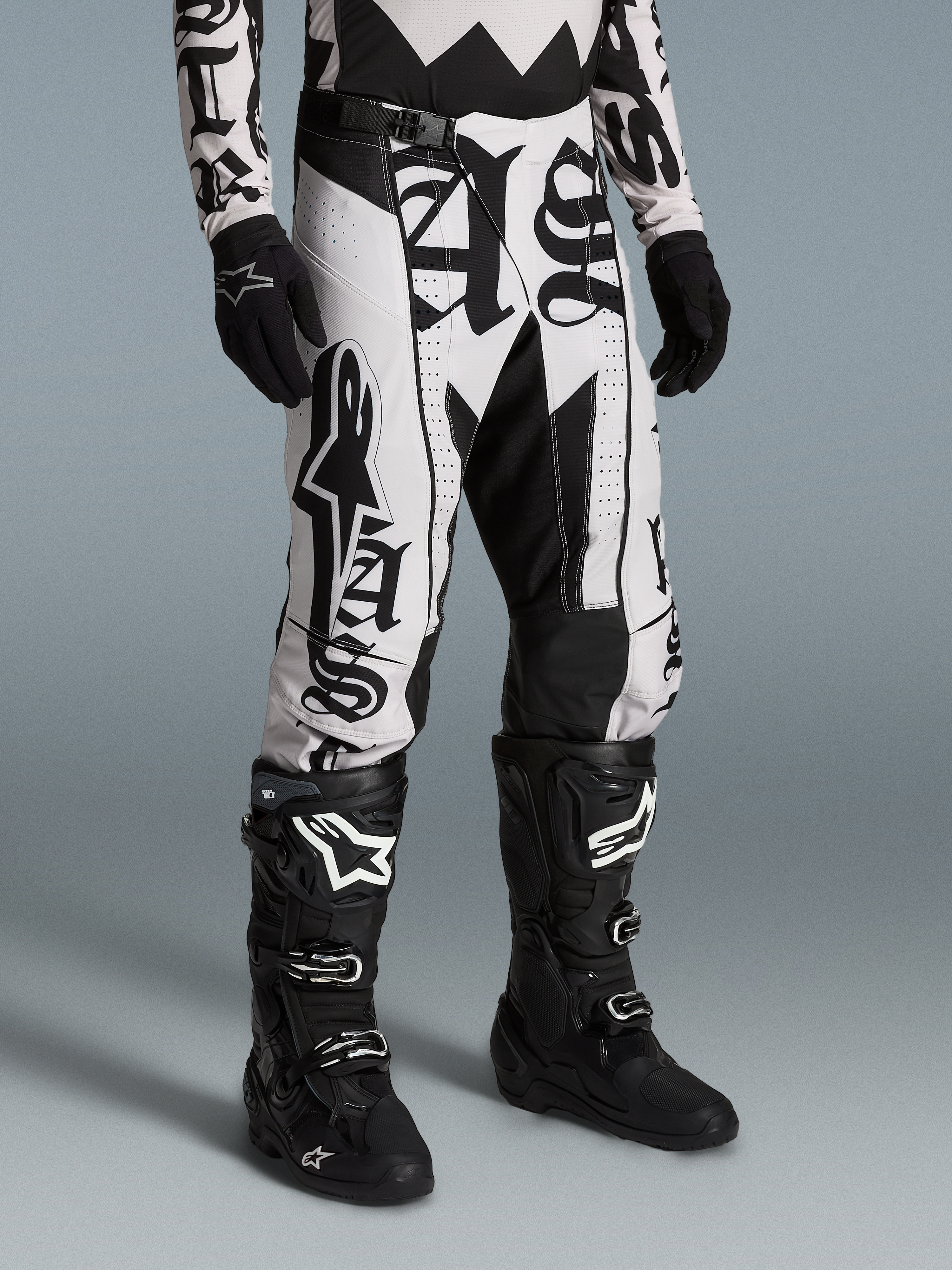 Alpinestars Limited Edition Techstar Wolf Dust Pants, black and white motocross gear with graphic print and athletic fit.