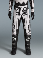 Alpinestars Limited Edition Techstar Wolf Dust Pants and Gear Set, black and white motocross gear for off-road performance.