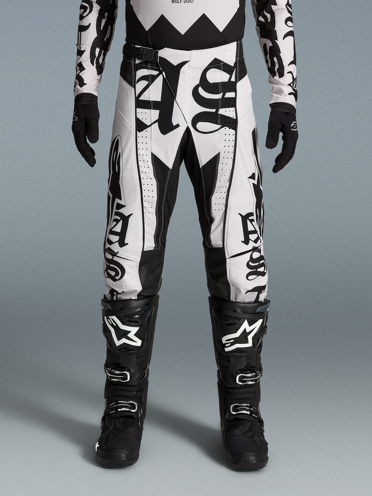 Alpinestars Limited Edition Techstar Wolf Dust Pants and Gear Set, black and white motocross gear for off-road performance.
