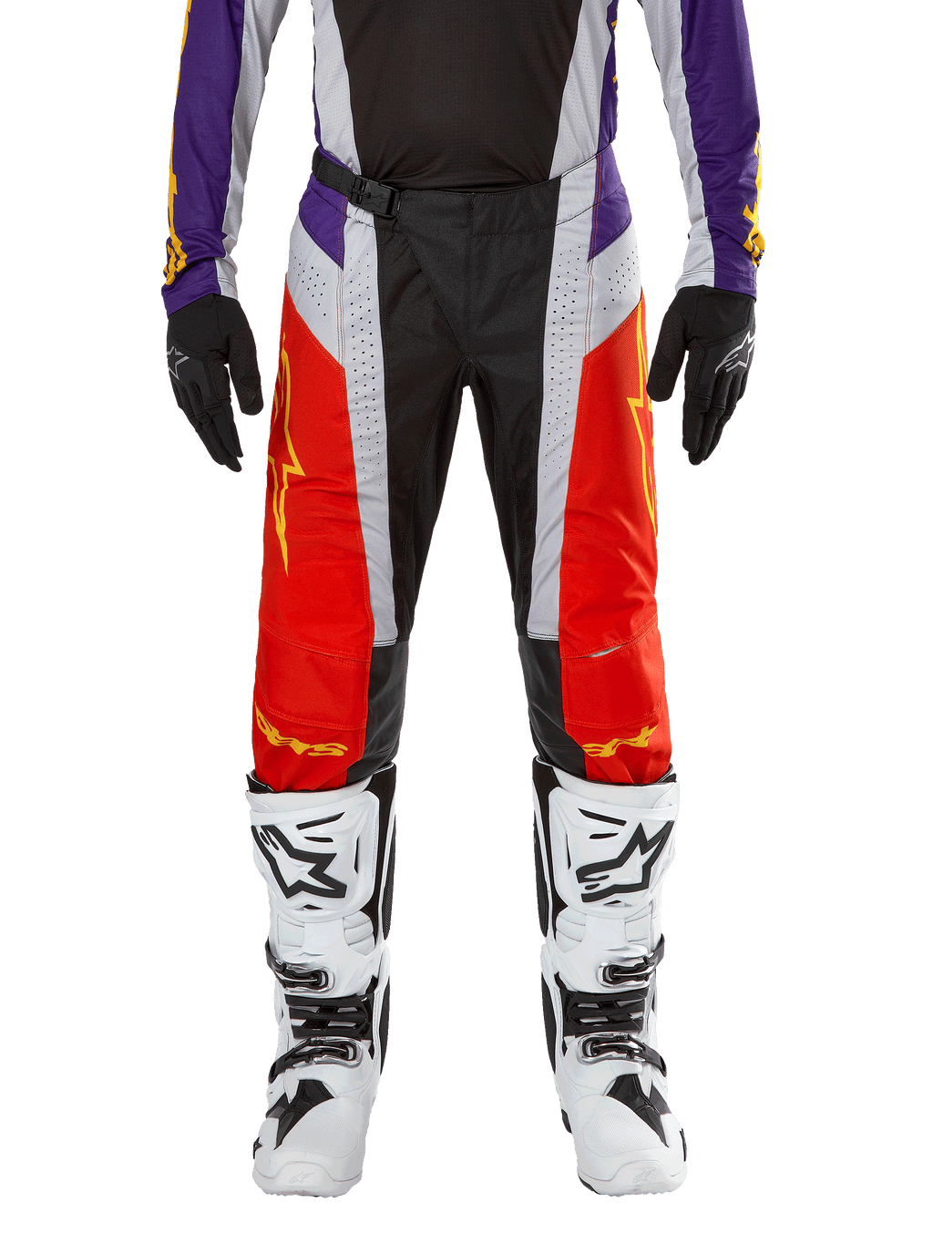 Alpinestars 2024 Techstar Ocuri Pants, Motocross Pants, Hot Orange Purple and Black, worn with matching jersey, black gloves, and white boots, featuring vibrant orange front panels, purple waist accents, and perforated grey sections, technical design for off-road racing