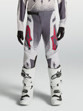 Alpinestars Youth Supertech Swan Pants, performance motocross racing gear in gray and lilac textile with red accents.
