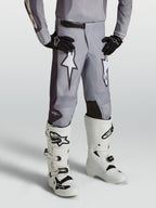 Alpinestars Youth Fluid Amber Pants, sand gray youth motocross pants with white star graphics and reinforced panels.