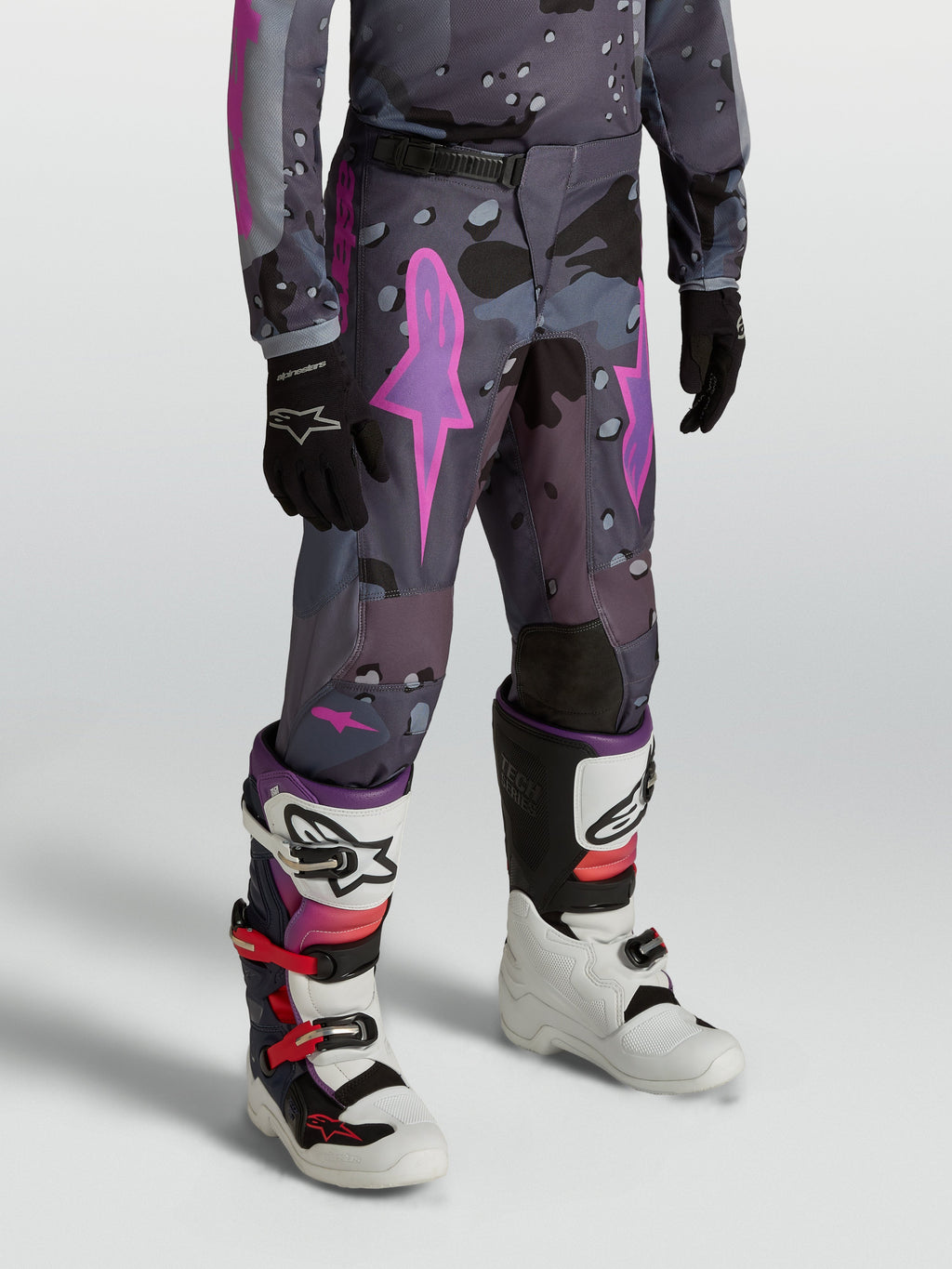 Alpinestars Youth Fluid Lone Pants, youth motocross pants in gray camo and purple, with durable 600D textile construction.
