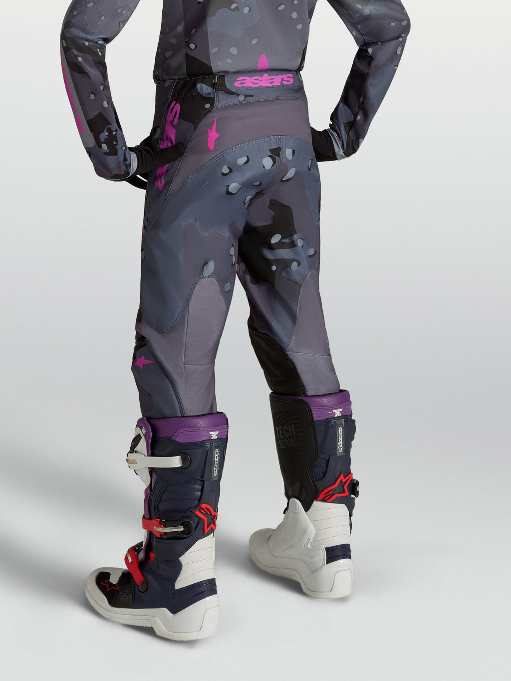 Alpinestars Youth Fluid Lone Pants, gray camo and purple youth motocross pants with ergonomic 3D fit, rear view on model.