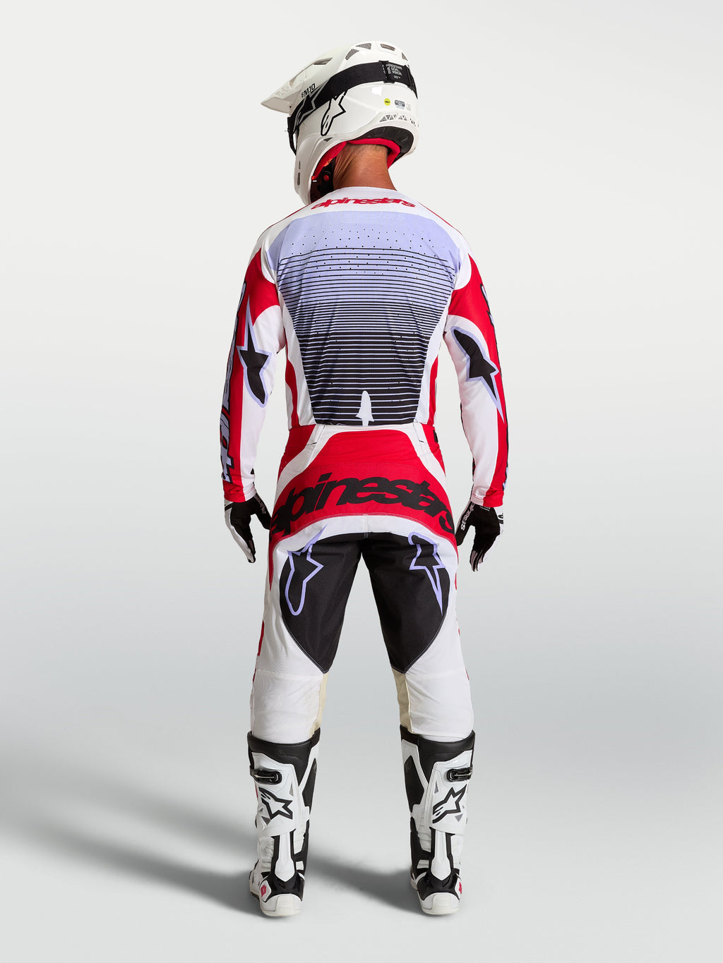 Alpinestars Techstar Maven Motocross Gear Set, Men's Fire Red and White racing jersey and pants, athletic fit, rear view.