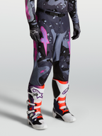 Alpinestars Racer Lone Pants, Gray Camo and Purple Motocross Pants for men, featuring a pre-curved race fit, 600D polyfabric, leather inner knee panels, and ergonomic stretch inserts for off-road performance.