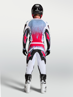 Alpinestars Fluid Drag Jersey, Men's Motocross Racing Jersey in Black and Red Fluo, shown from a rear view on a rider.