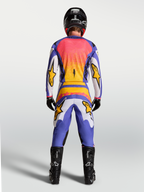 Alpinestars Fluid Drag Pants and Gear Set, Men's lilac and blue iris gold motocross outfit, rear view on model.