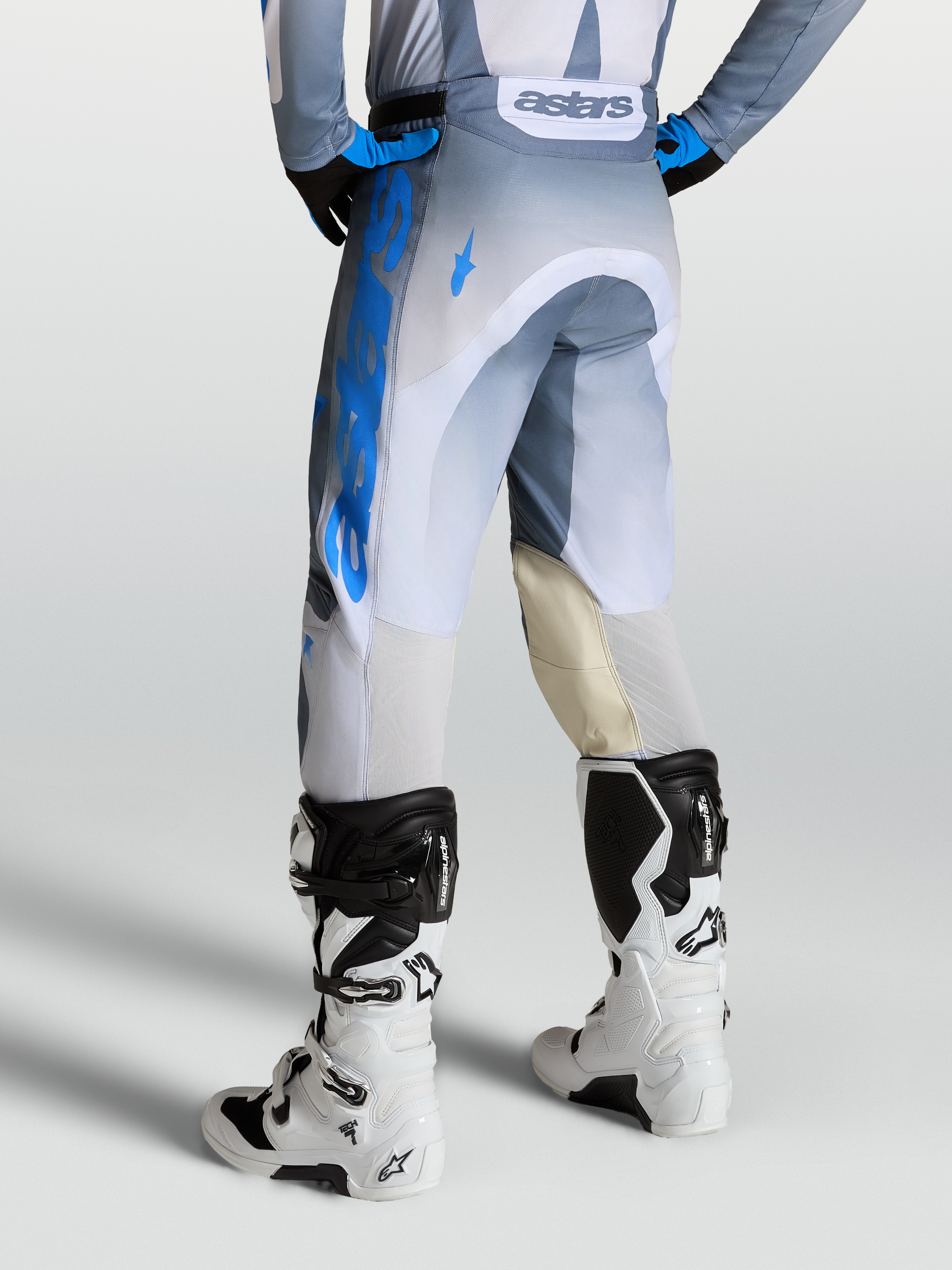 Alpinestars Racer Amber Pants, Men's Motocross Pants in Ash Gray and UCLA Blue, with leather knee panels and back ventilation.