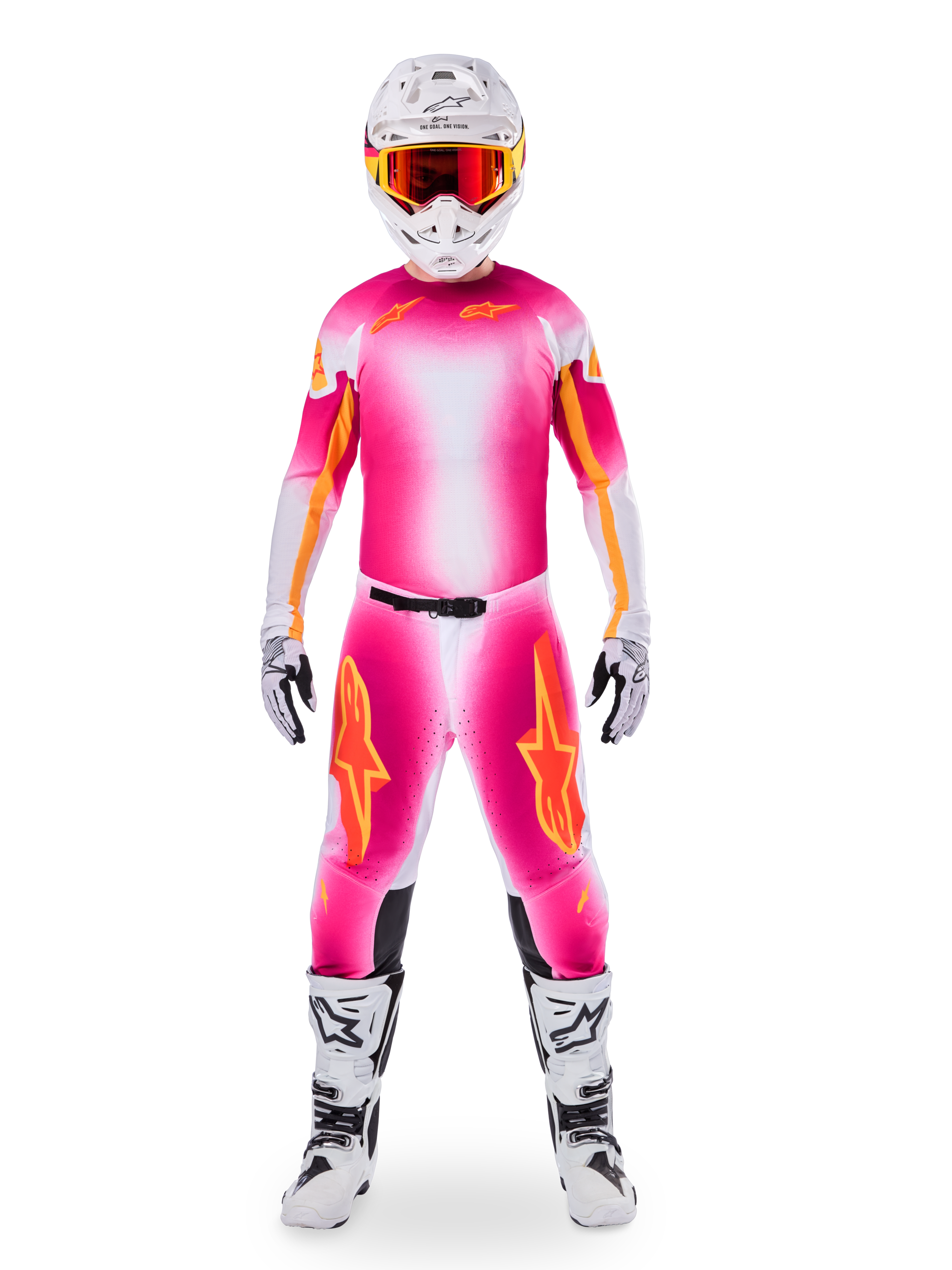 Motocross rider wearing complete racing gear, Limited Edition Supertech AFD MIG Jersey in Pink Fluo and White, matching pants with orange star accents, white helmet with red goggles, white and black boots, coordinated professional motocross outfit