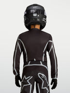 Alpinestars Youth Fluid Apex V2 Jersey, Black and Silver motocross top with ergonomic fit and extended rear coverage.