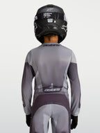 Alpinestars 2027 Youth Fluid Amber Jersey, Youth Motocross Jersey, Sand and Gray, breathable textile for off-road performance.