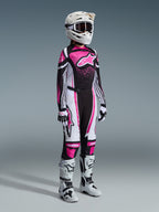 Alpinestars 2026 Stella Techstar Nomur Gear Set, full women's motocross racing gear, vibrant pink black and white jersey with matching pants, white helmet and goggles, white and black boots, professional coordinated motocross outfit