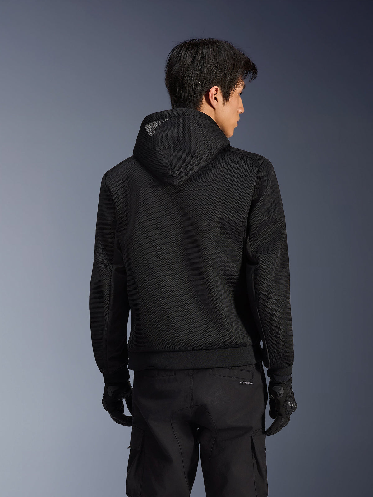 Alpinestars Chrome Superairflow Hoodie, Black motorcycle sport riding hoodie with breathable 3D mesh, back view on a model.