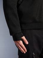 Alpinestars Chrome Superairflow Hoodie in Black, featuring 3D mesh and an elastic loop sleeve holder for motorcycle riding.