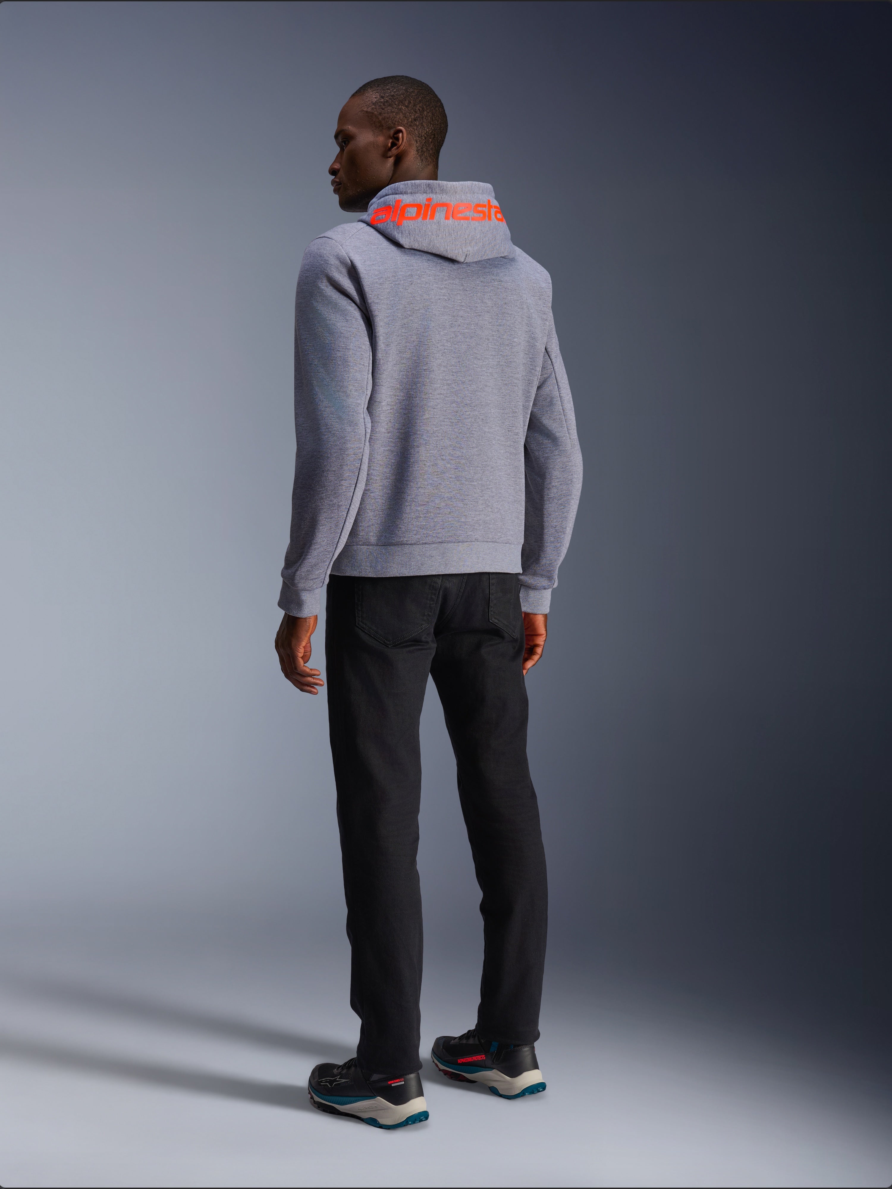Alpinestars Chrome V2 Sport Hoodie in Gray Heather and Red Fluo, urban motorcycle textile jacket, back view on model.