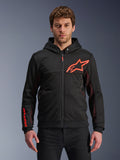 Alpinestars Chrome Air Sport Hoodie, Black zip-up hoodie with red fluo star logo and sleeve accents, red mesh side panels for ventilation, casual urban riding gear worn by a model