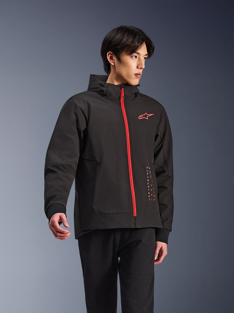Alpinestars Radium Tech Hoodie, urban motorcycle jacket, Black with Bright Red zipper, featuring red Alpinestars logo on chest and red text on side, technical windproof shell with hood and ribbed cuffs, modern street style for riders