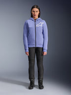 Alpinestars Woman Stella Chrome V2 Sport Hoodie, Blue Violet with white Astars logo on the chest, full-zip technical fleece with hood, worn with black motorcycle pants and riding boots, casual urban riding gear for women