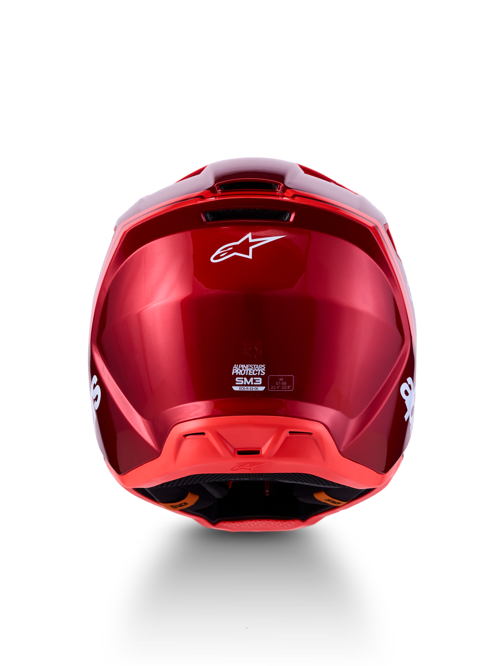 Alpinestars SM3 Radium Helmet, Red Motochrome motocross helmet, rear view with ventilation ports and ECE certification.
