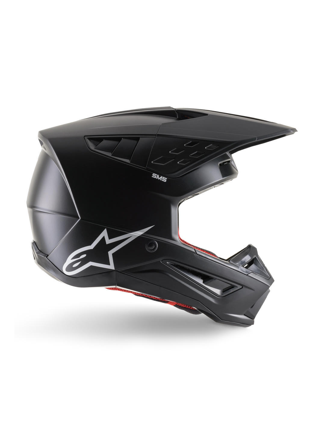 Alpinestars S-M5 Solid Helmet, Motocross Helmet, Matte Black, featuring white Alpinestars star logo and red interior lining, aerodynamic design with multiple air vents and long visor, ECE 22.06 certified off-road protection