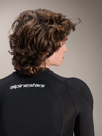 Alpinestars A-Impact Plasma Protection Jacket, Long Sleeve, Black with white Alpinestars logo on the upper back, featuring breathable mesh panels and integrated shoulder protection for MTB riders
