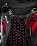 Tech-Air® Off-Road System detail featuring black honeycomb Nucleon CELL protection and red Alpinestars branding.