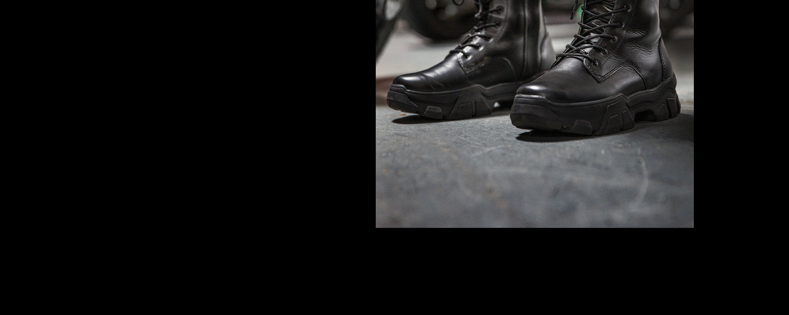 Alpinestars Ava Women's Urban Boots, black leather motorcycle footwear with chunky soles, worn on the street.